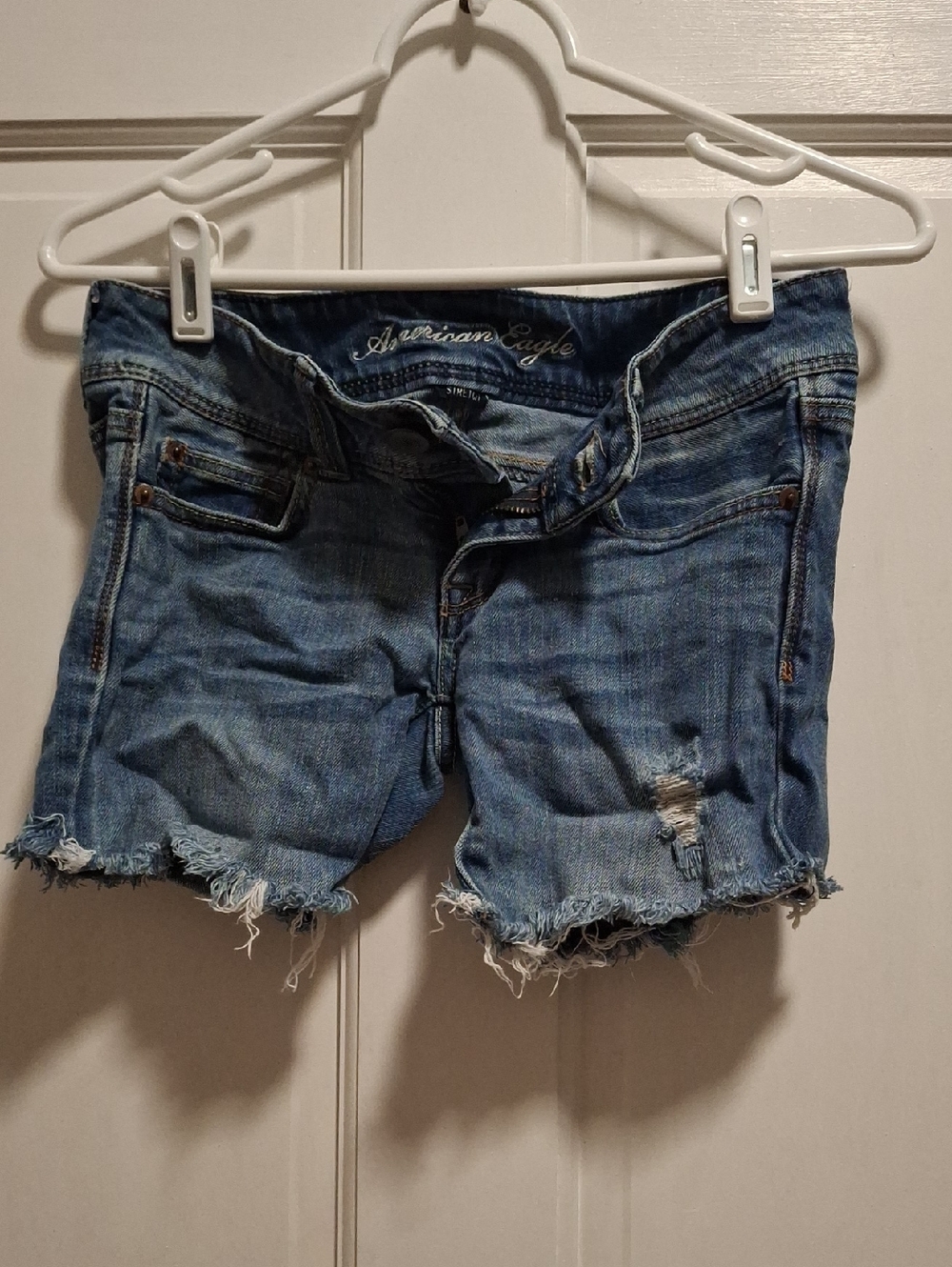 American Eagle Outfitters Medium Blue Distressed Denim Cutoff Shorts Size 0